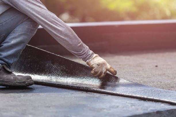 Professional Waterproofing technician working in Ithaca, NY